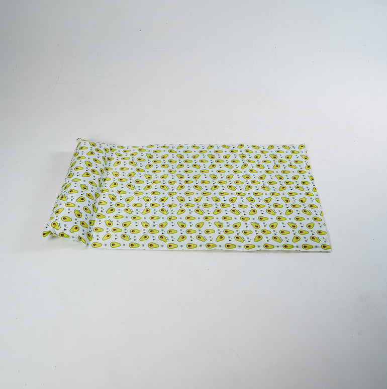 My Store dog cooling bed with breathable fabric and raised edges for comfort, placed on a patio in sunny weather.