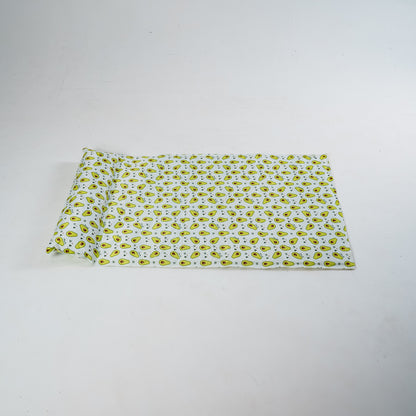 My Store dog cooling bed with breathable fabric and raised edges for comfort, placed on a patio in sunny weather.